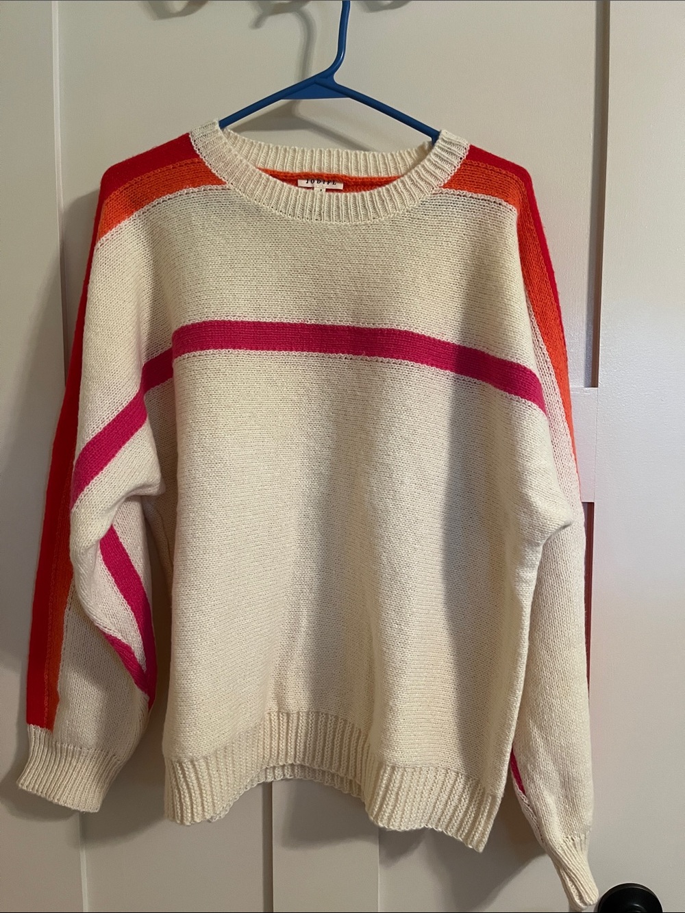 Jodifil sweater. Ivory with fuscia, orange & red stripes. NWOT. Size small